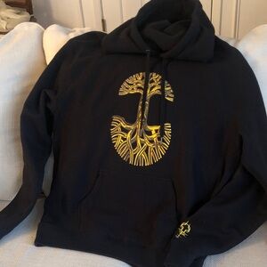 Black Hoodie with Yellow Graphic Design